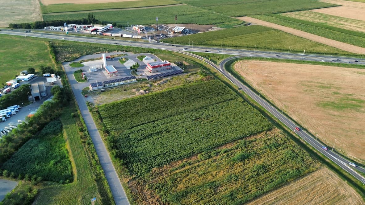 Drone view of the Nova Pazova development parcel beside the local access road and A1 highway interchange