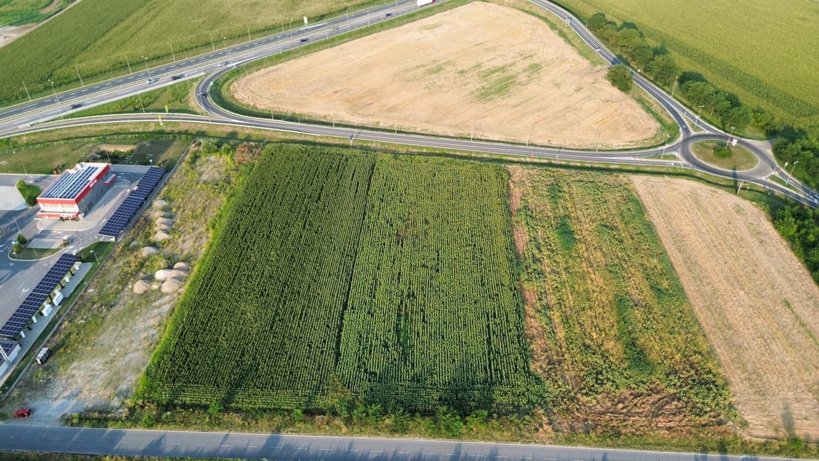 Overhead drone view showing the full Nova Pazova parcel and its access roads
